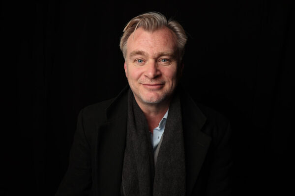Christopher Nolan storytelling style visualized through cinematic time and emotional storytelling